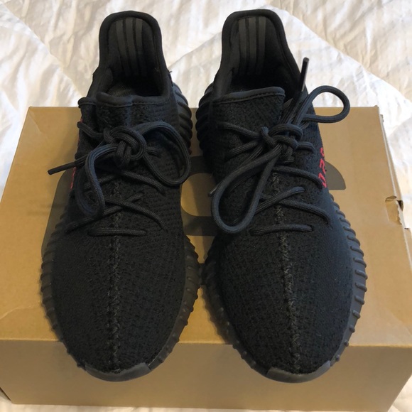 black yeezy red writing